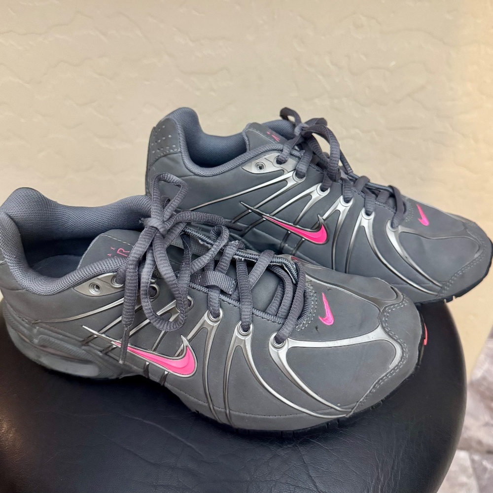 Nike Women's Gray Athletic Sneakers with Pink Swoosh